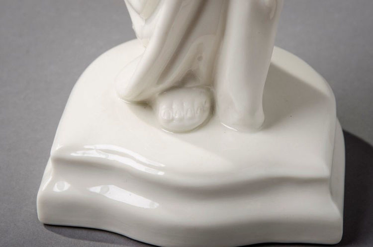 Picture of Porcelain Figurine (Hand to Chest)